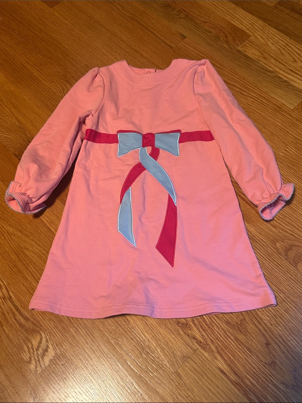 The Beaufort Bonnet Company Pink Dress with Red and Light Blue Bow